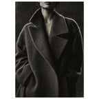 The Oversized Lapel, a chin-to-hip photograph of a model in a wool coat with a brightly outlined shoulder against charcoal sh