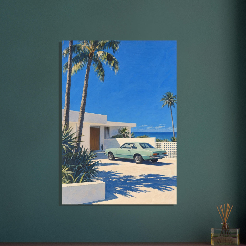 Mint-green vintage car outside a cream coastal villa, with tall palms, vivid blue sky, sea and strong shadows.