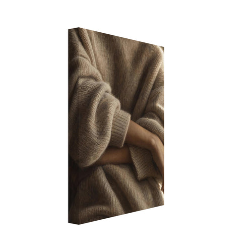 Cashmere and Quiet, a close crop of crossed forearms over a voluminous cream jumper, with warm taupe shadows and a softly lit