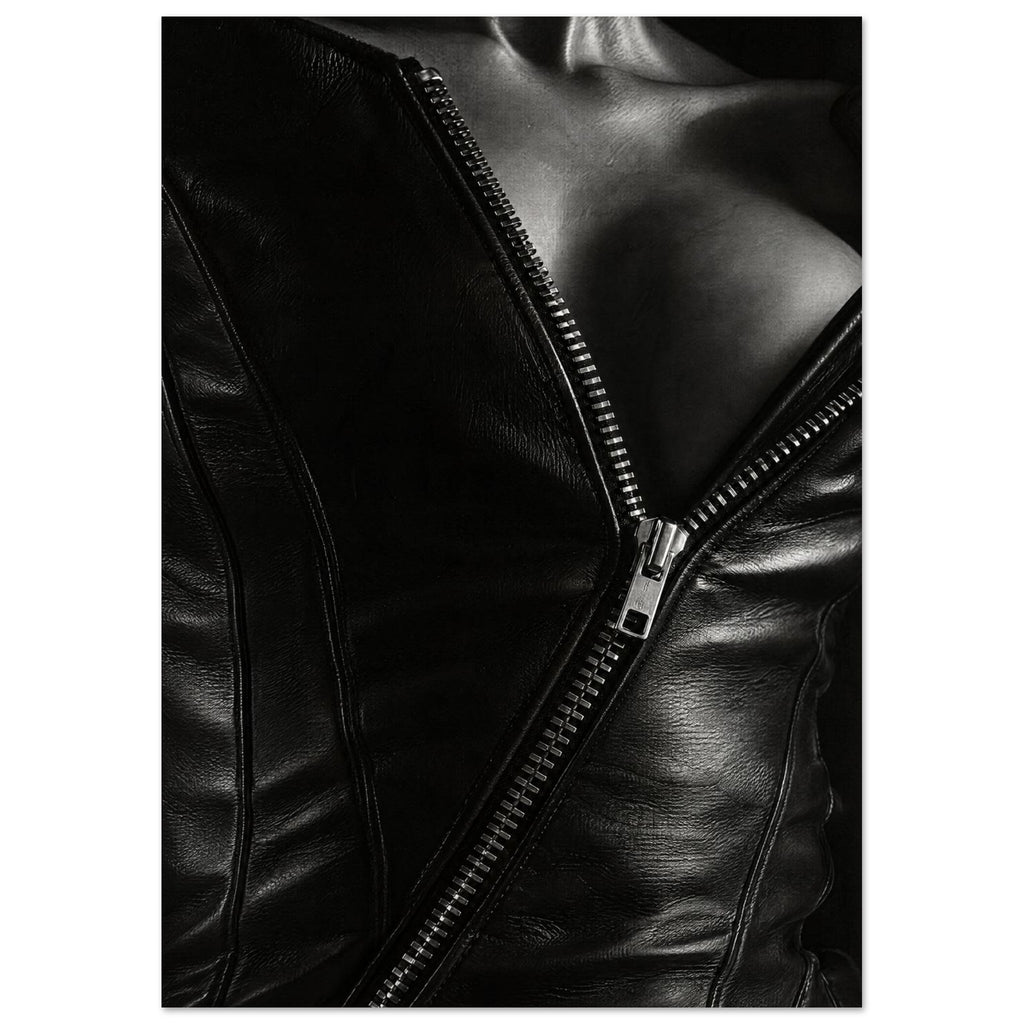 Black and white close-up of an open leather jacket with a diagonal metal zip and an exposed neckline.