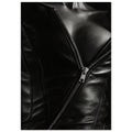 Black and white close-up of an open leather jacket with a diagonal metal zip and an exposed neckline.