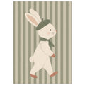 Cream bunny wearing a green beret and scarf, walking against muted green and beige vertical stripes.