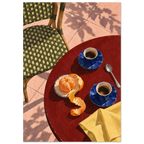 Two blue coffee cups, a peeled orange, spoon and yellow cloth on a red table beside a green woven chair and pink tiles.