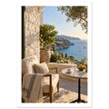 Sunlit stone terrace with a cushioned chair, round table and potted lemon tree overlooking blue sea and cliffs.