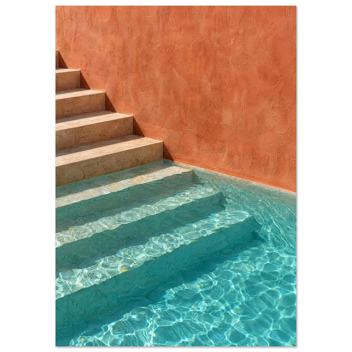 Stone steps descending into turquoise pool water beside a terracotta wall, with sunlight rippling across submerged stairs.