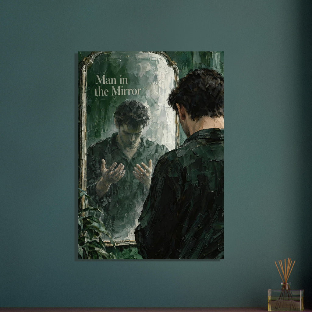 Man facing a tall mirror, his reflection looking down at raised hands, with green brushstrokes and ‘Man in the Mirror’ text.