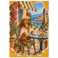 Brown dog in a cream shirt at a café table with coffee and a croissant, overlooking a harbour with boats.