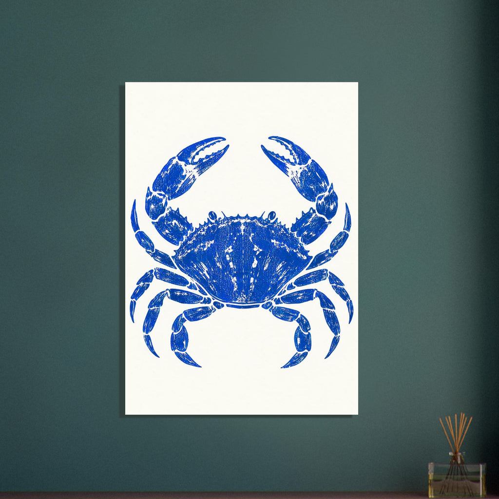 Ultramarine blue crab with raised claws and distressed detailing, centred on a warm cream background.