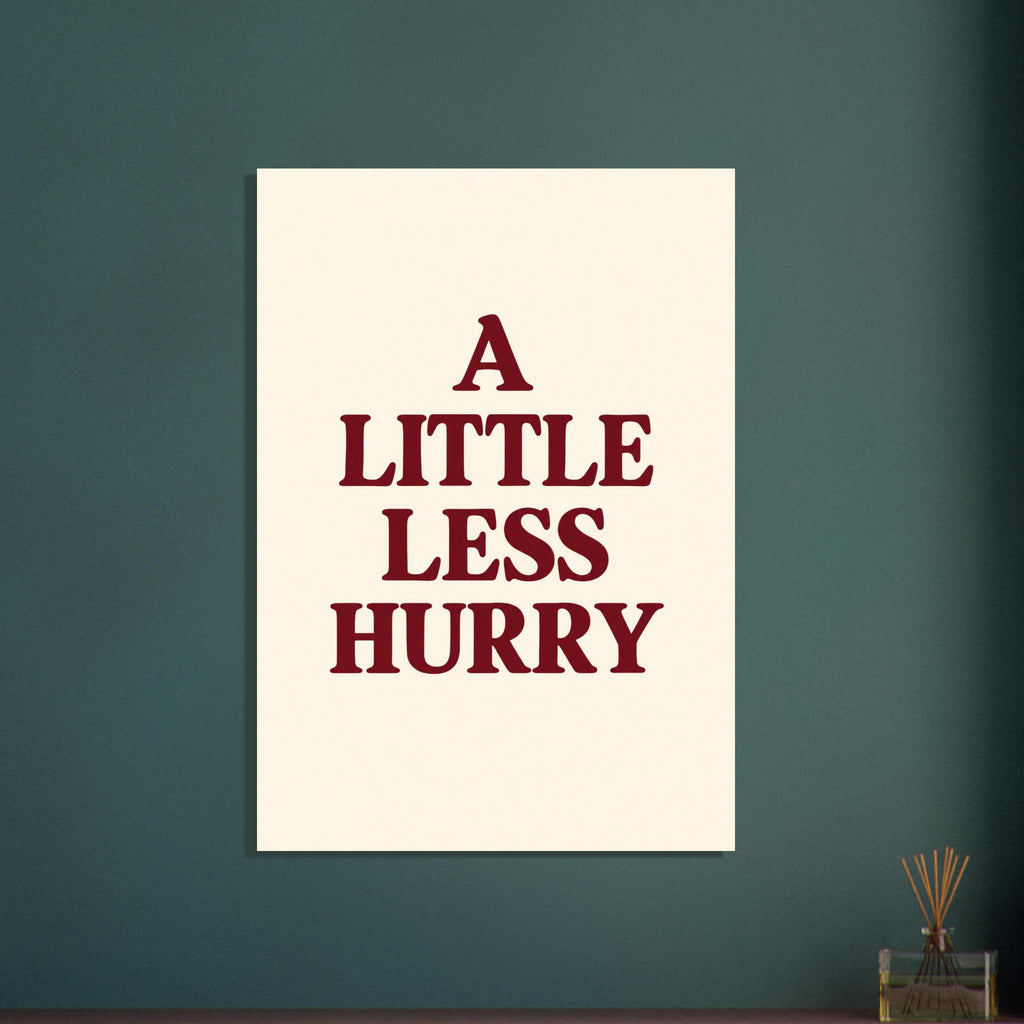 A Little Less Hurry in bold burgundy serif capitals, arranged over four centred lines on a cream background.