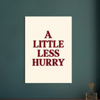 A Little Less Hurry in bold burgundy serif capitals, arranged over four centred lines on a cream background.