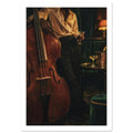 Double bass beside a figure holding a stemmed glass, with dark green seating, a drinks table and a glowing lamp.