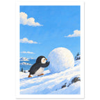 Penguin pushing a giant snowball up a snowy slope, with blue water, distant mountains and white clouds behind.