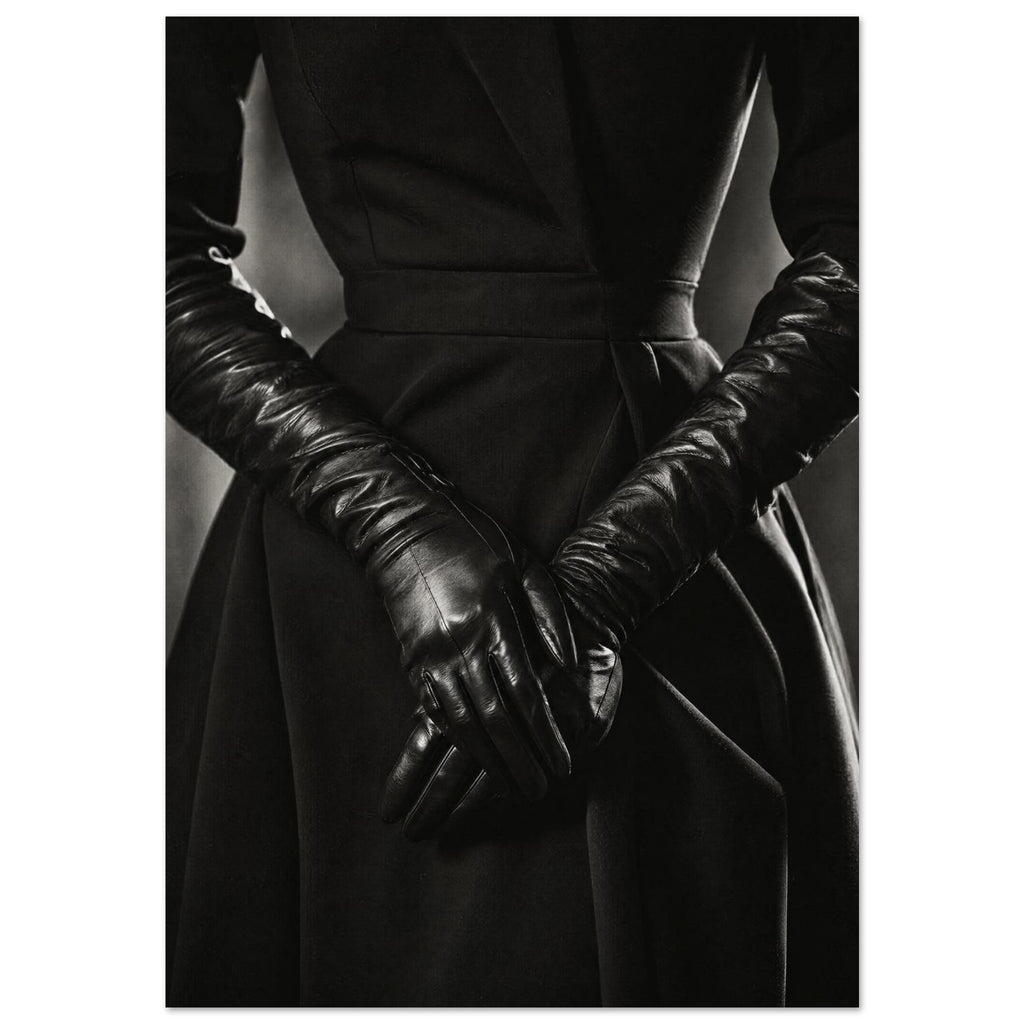 Overlapping hands in long black leather gloves against a dark fitted outfit, photographed in black and white.
