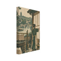 Paper-drying workshop with a figure brushing sheets on a wall, wooden tubs, boats, an arched bridge and a distant pagoda.