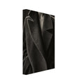 The Oversized Lapel, a chin-to-hip photograph of a model in a wool coat with a brightly outlined shoulder against charcoal sh