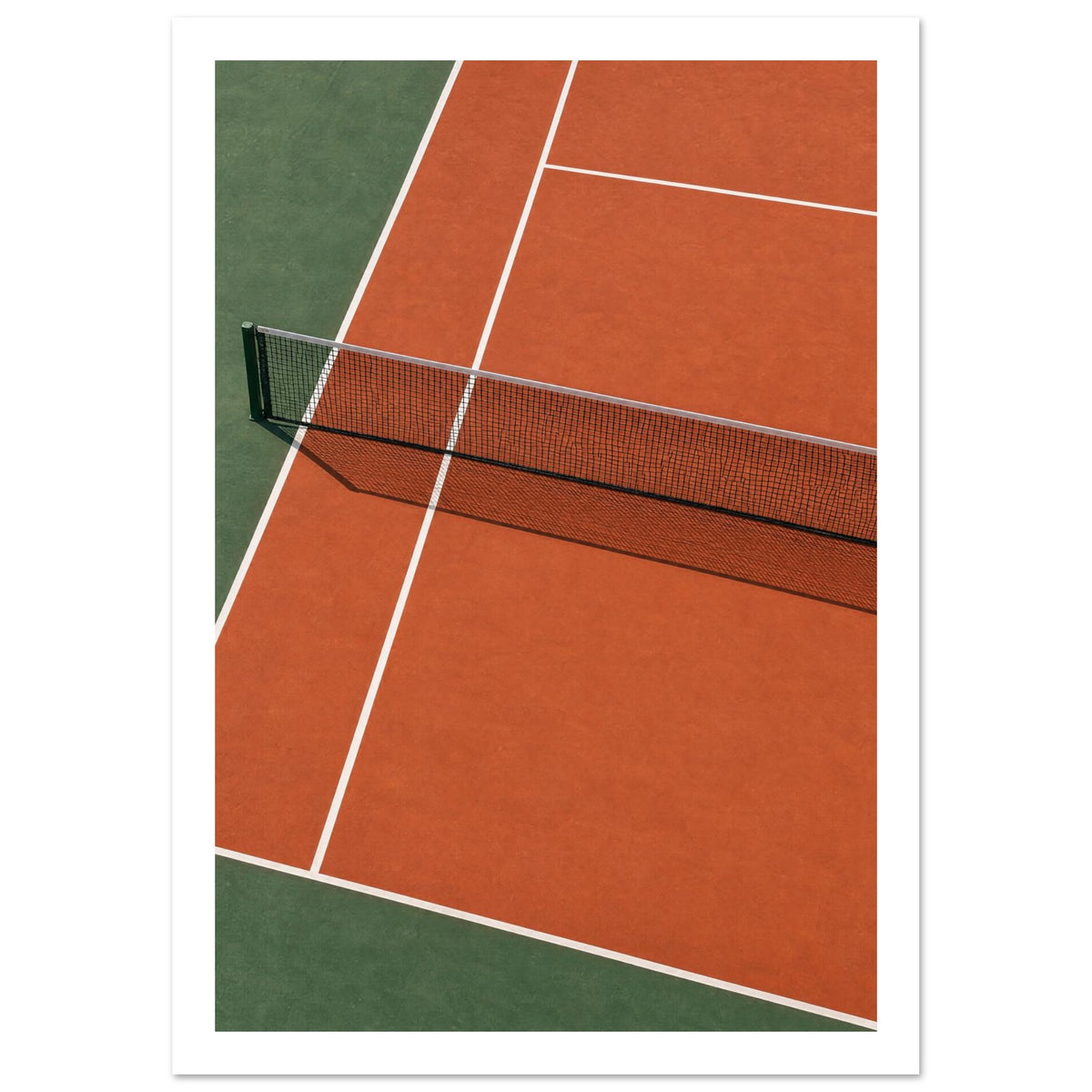Tennis court viewed from above, with terracotta and green surfaces, white lines and a net casting a patterned shadow.