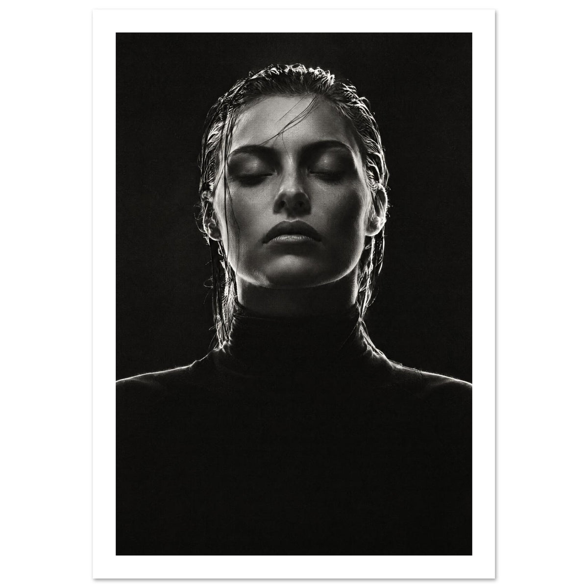 Black and white portrait of a woman with closed eyes, slicked-back hair and a dark high-neck top against black.