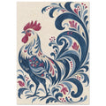 Decorative blue and cream rooster with a burgundy comb, surrounded by sweeping blue floral scrolls on cream.