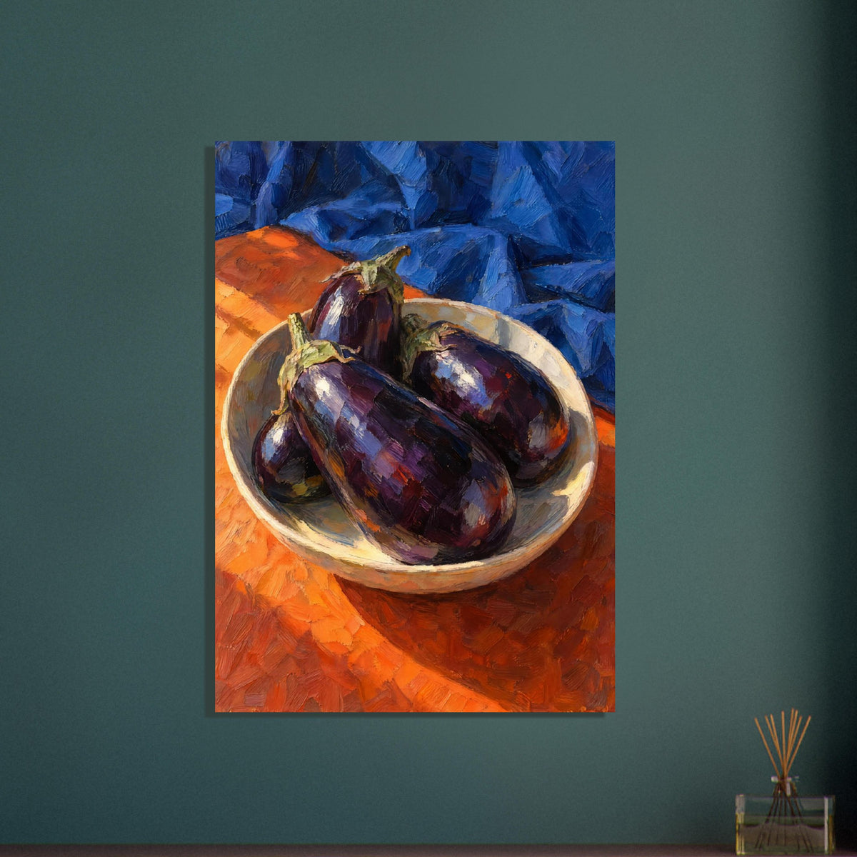 Purple aubergines in a shallow cream bowl on an orange surface, with folded blue fabric and bold visible brushstrokes.