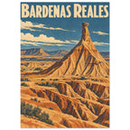 Bardenas Reales lettering above an orange desert rock pinnacle, eroded ridges and sparse shrubs beneath a blue sky.