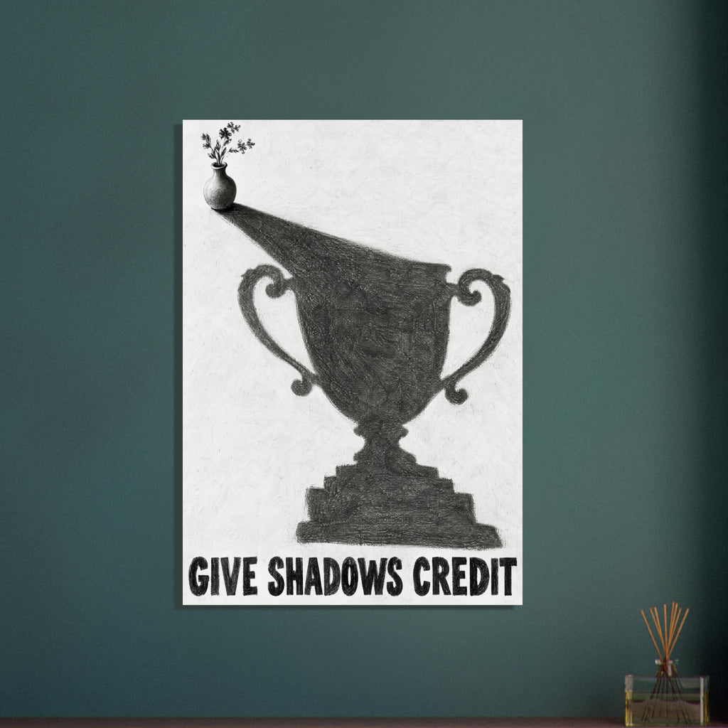 Small flower vase casting a large trophy-shaped shadow above bold lettering reading ‘GIVE SHADOWS CREDIT’.