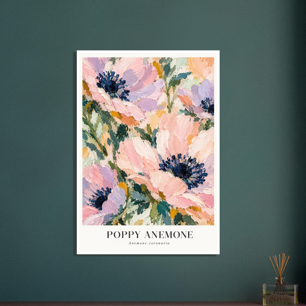 Pink and lilac anemones with navy centres and green foliage, above the words ‘POPPY ANEMONE’ and ‘Anemone coronaria’.
