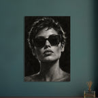Behind the Sunglasses, a tightly cropped frontal face wearing large geometric sunglasses, with rim-lit short hair against bla