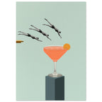 Three monochrome divers leap towards a giant orange cocktail with an orange slice on a dark plinth against pale mint.