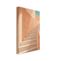 Curved staircase with pale steps, peach and terracotta walls, patches of sunlight and a turquoise opening above.