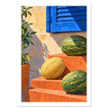Three green and yellow melons on terracotta steps beneath a blue shutter, with a leafy potted plant at the left.