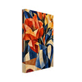 Angular orange and yellow flowers in a blue jug, with a halved orange on a tabletop against a geometric background.