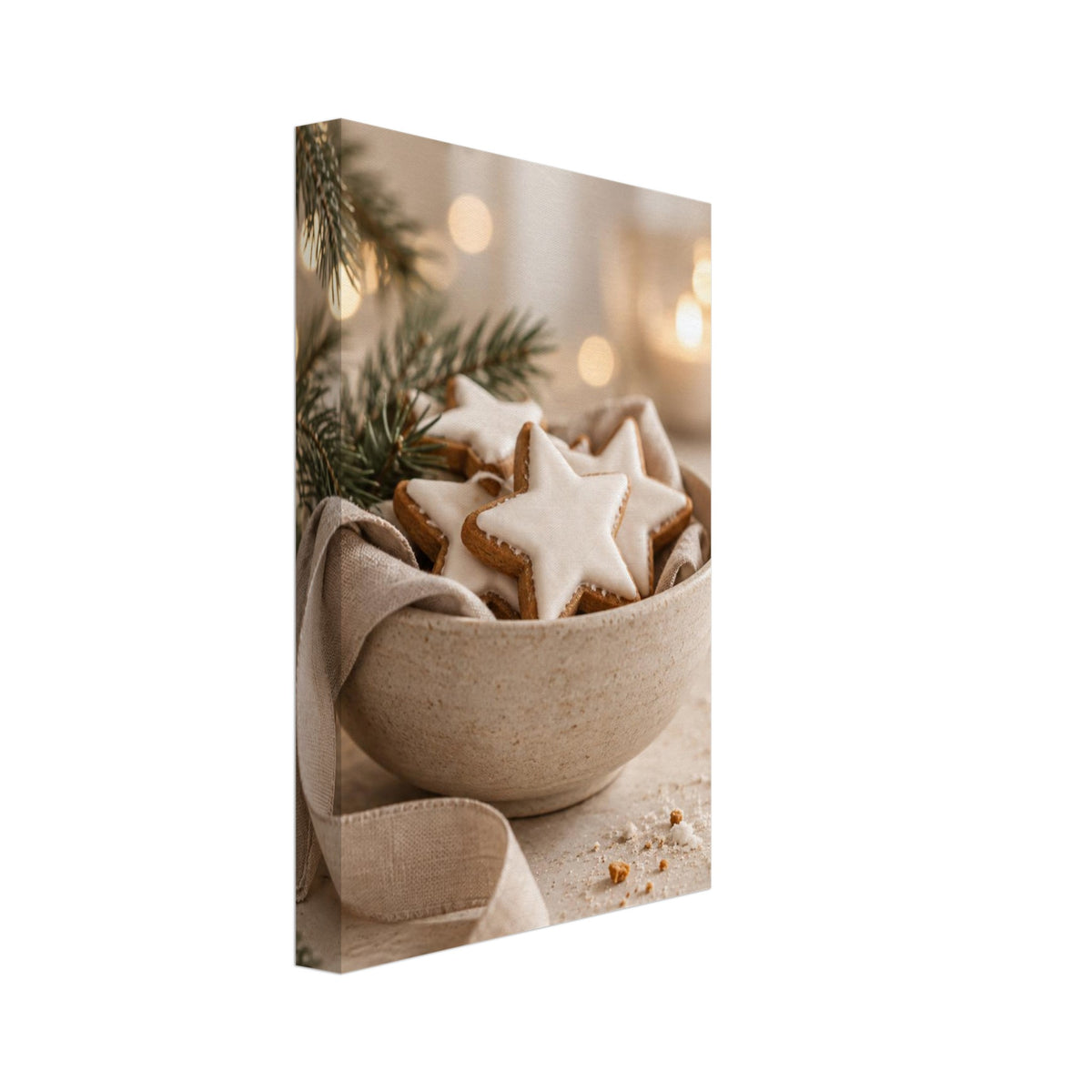 White-iced star biscuits in a linen-lined ceramic bowl, with evergreen branches, warm blurred lights and scattered crumbs.