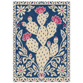 Cream prickly pear cactus with pink blooms on a textured navy background, surrounded by an ornate floral border.