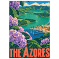 Pink and purple hydrangeas frame green lakes, mountain ridges and a village harbour above bold ‘The Azores’ lettering.