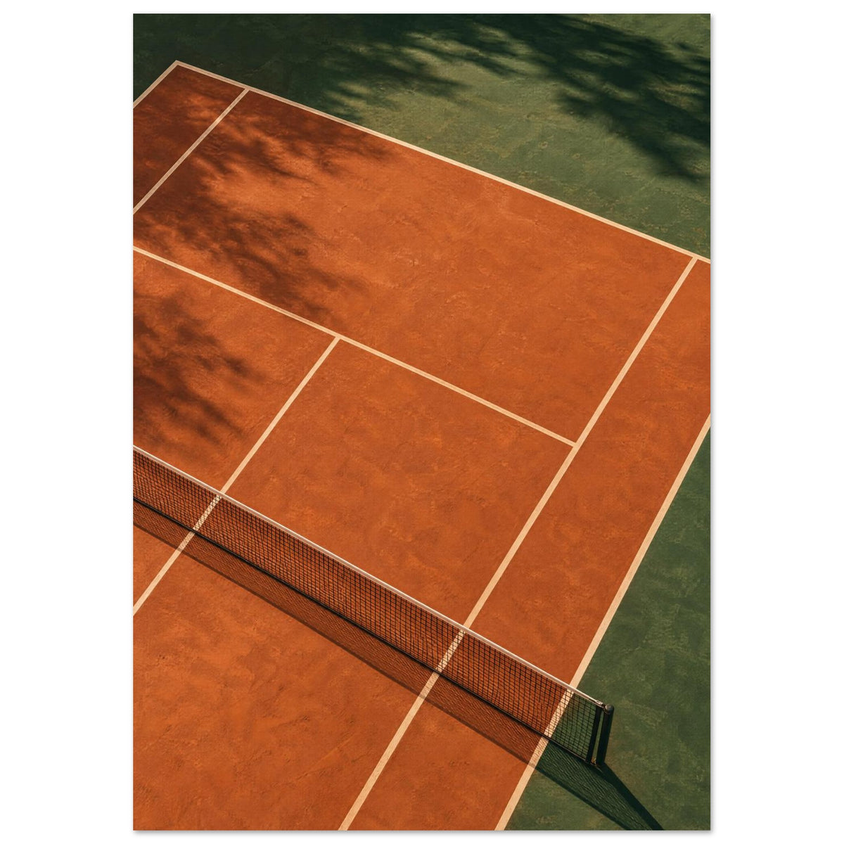 Terracotta tennis court viewed from above, with green surrounds, pale lines, a dark net and tree shadows.