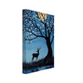 Deer beneath a black tree with white blossom-like dots, a yellow moon in a blue sky and reflections in water below.