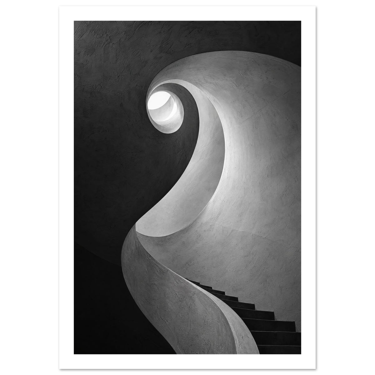 Spiral staircase viewed from below, with curved textured walls, dark steps and a bright opening in black and white.