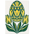 Yellow and green patterned Easter egg above two yellow tulips and sweeping green leaves on a cream background.