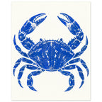 Ultramarine blue crab with raised claws and distressed detailing, centred on a warm cream background.