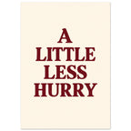 A Little Less Hurry in bold burgundy serif capitals, arranged over four centred lines on a cream background.